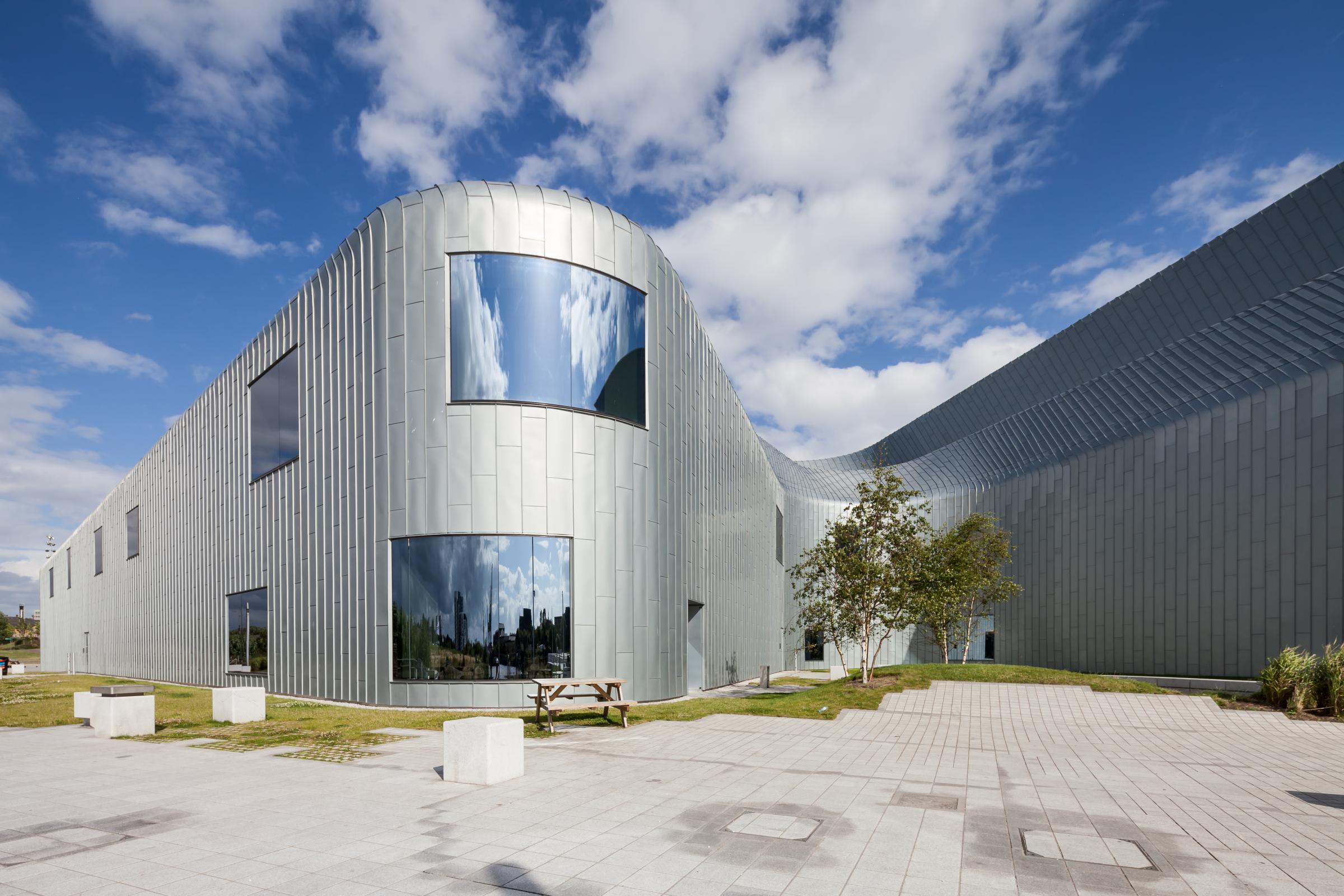 Photograph of Riverside Museum of Transport, designed by Zaha Hadid Architects and located in Glasgow, United Kingdom
