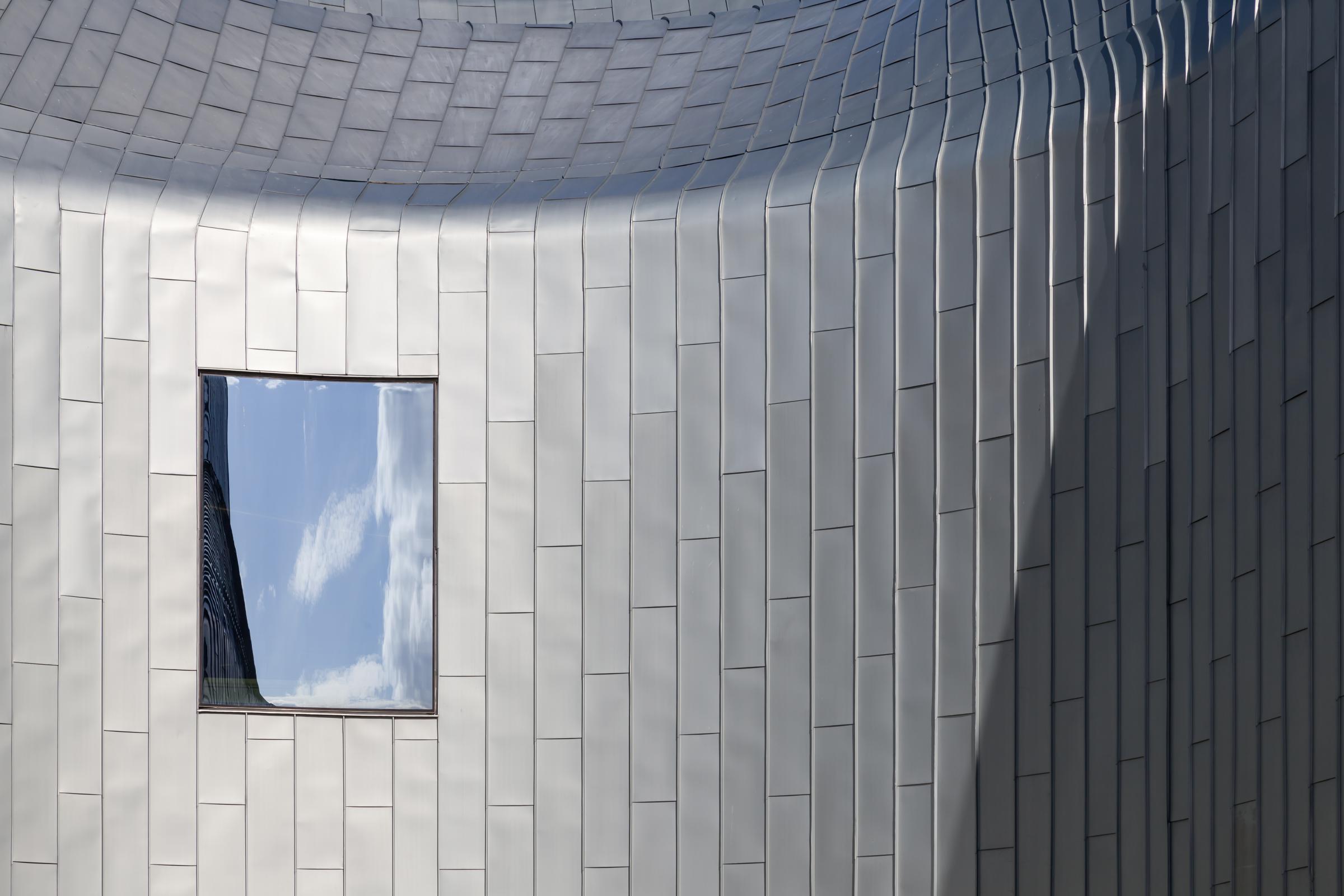 Photograph of Riverside Museum of Transport, designed by Zaha Hadid Architects and located in Glasgow, United Kingdom