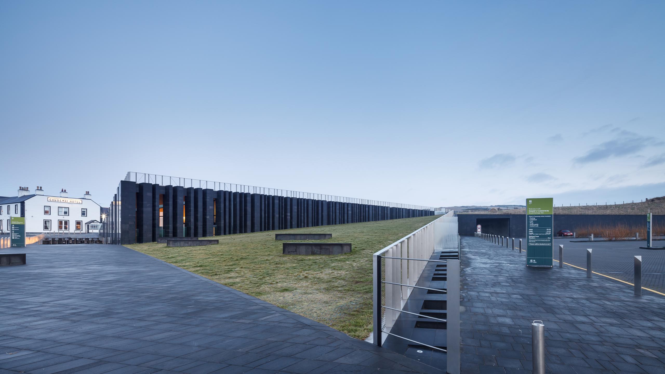 Photograph of Giants Causway Visitor Centre, designed by Heneghan Peng Architects and located in Bushmills, United Kingdom