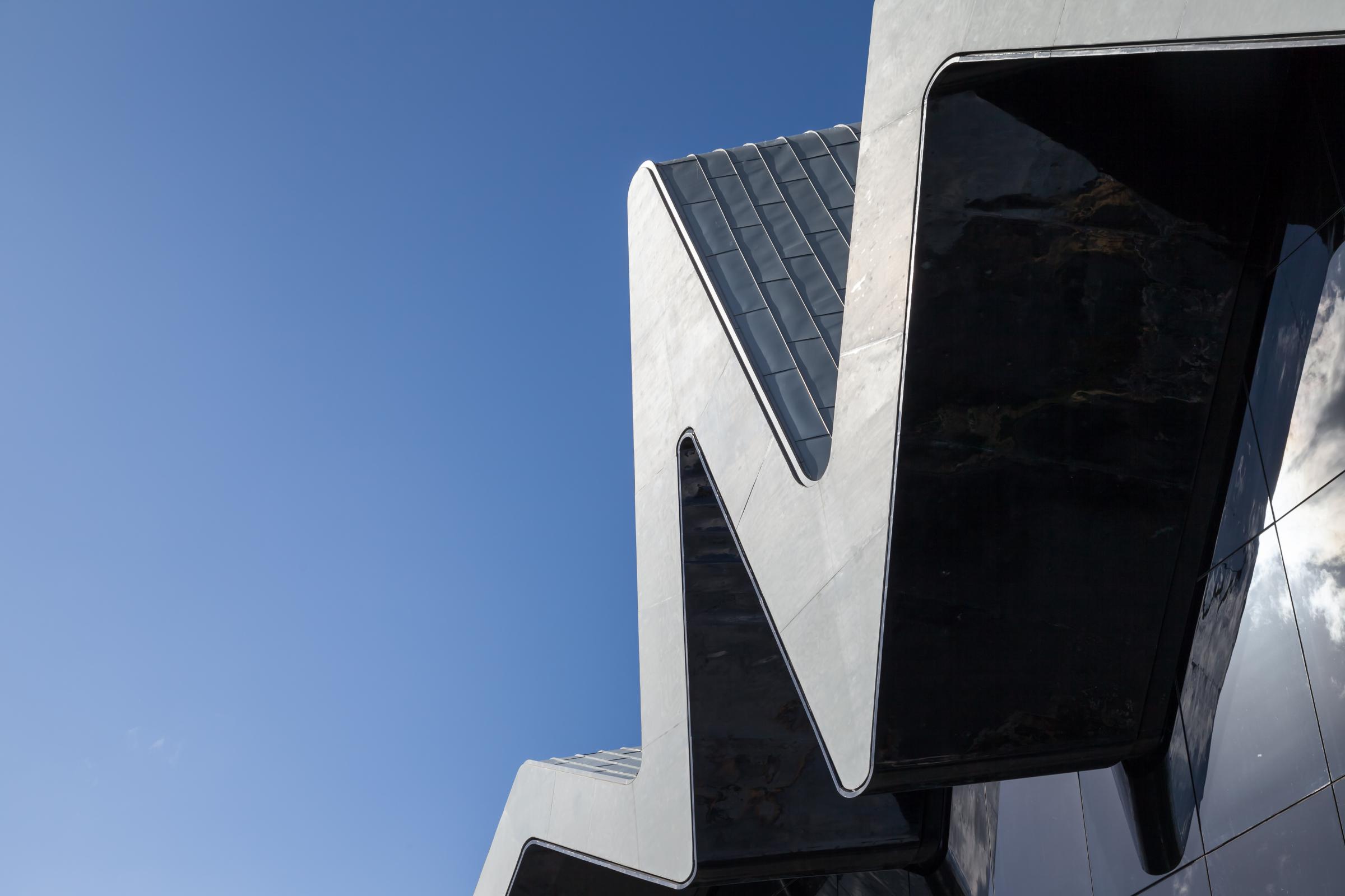 Photograph of Riverside Museum of Transport, designed by Zaha Hadid Architects and located in Glasgow, United Kingdom
