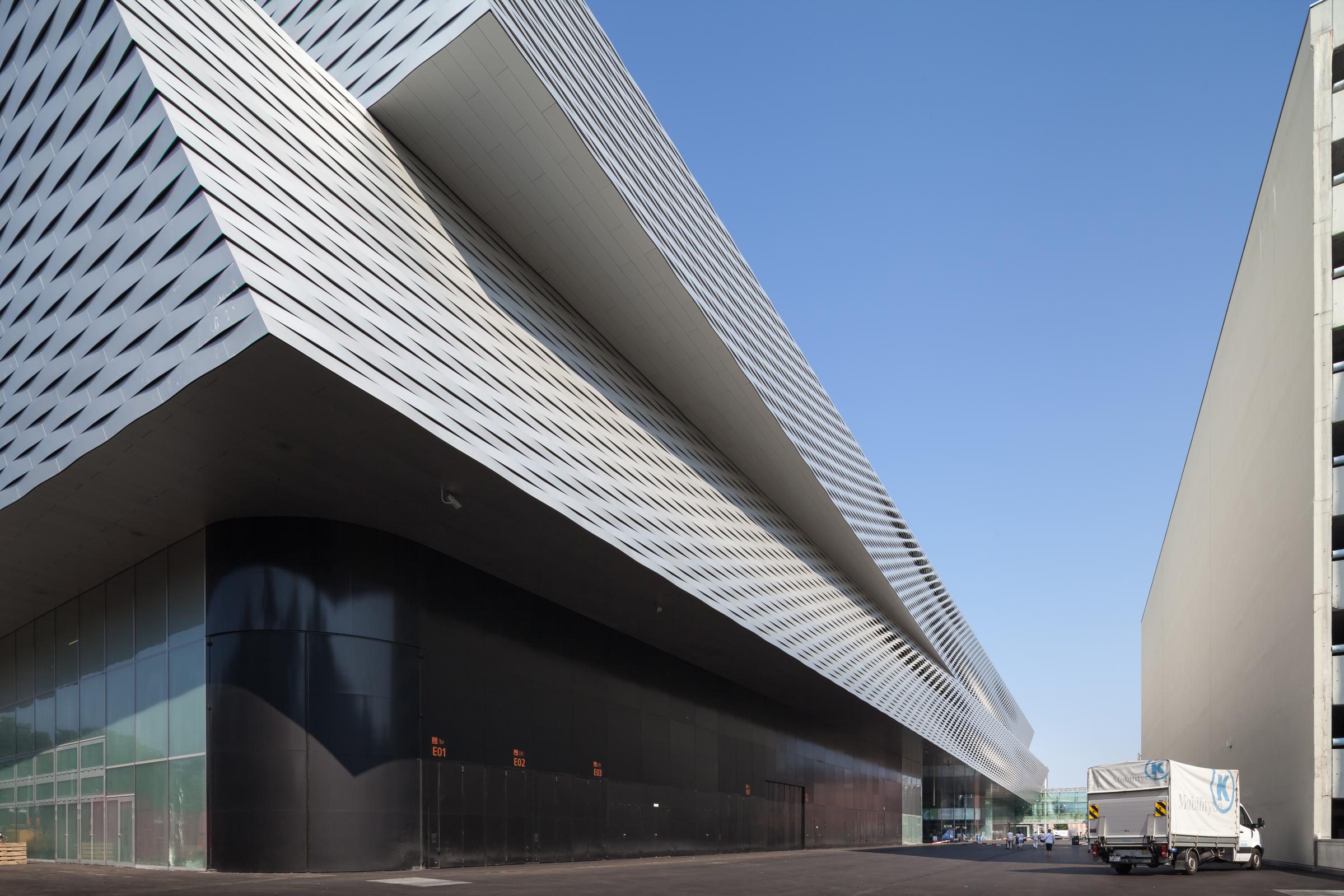 Photograph of Messe Basel New Hall, designed by Herzog & de Meuron and located in Basel, Switzerland